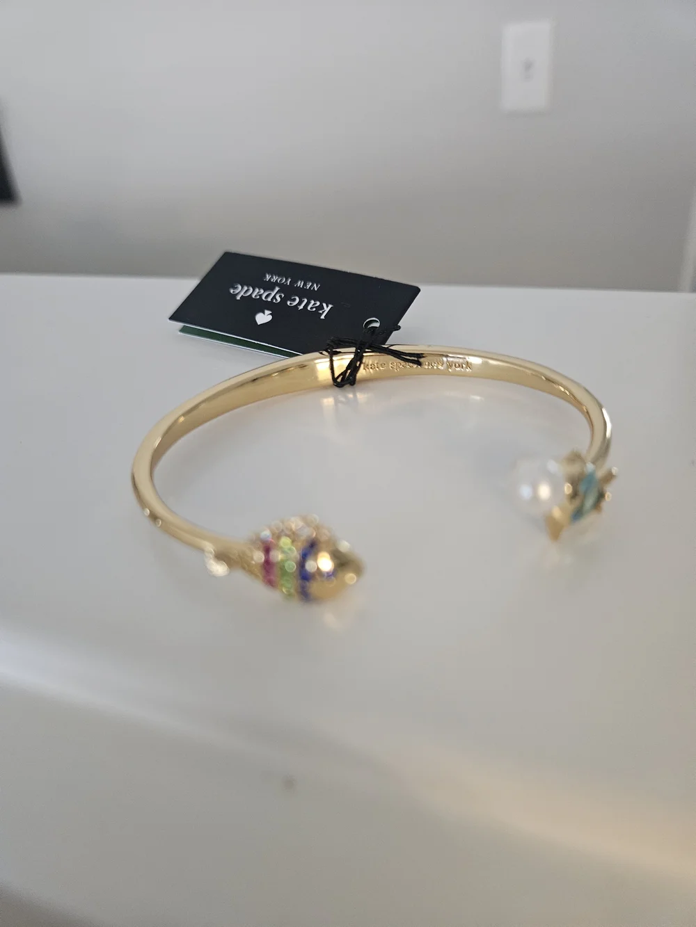 kate spade Gold Open Bangle with Blue Crystal Fish and Pearl Accent - Picture 6 of 6